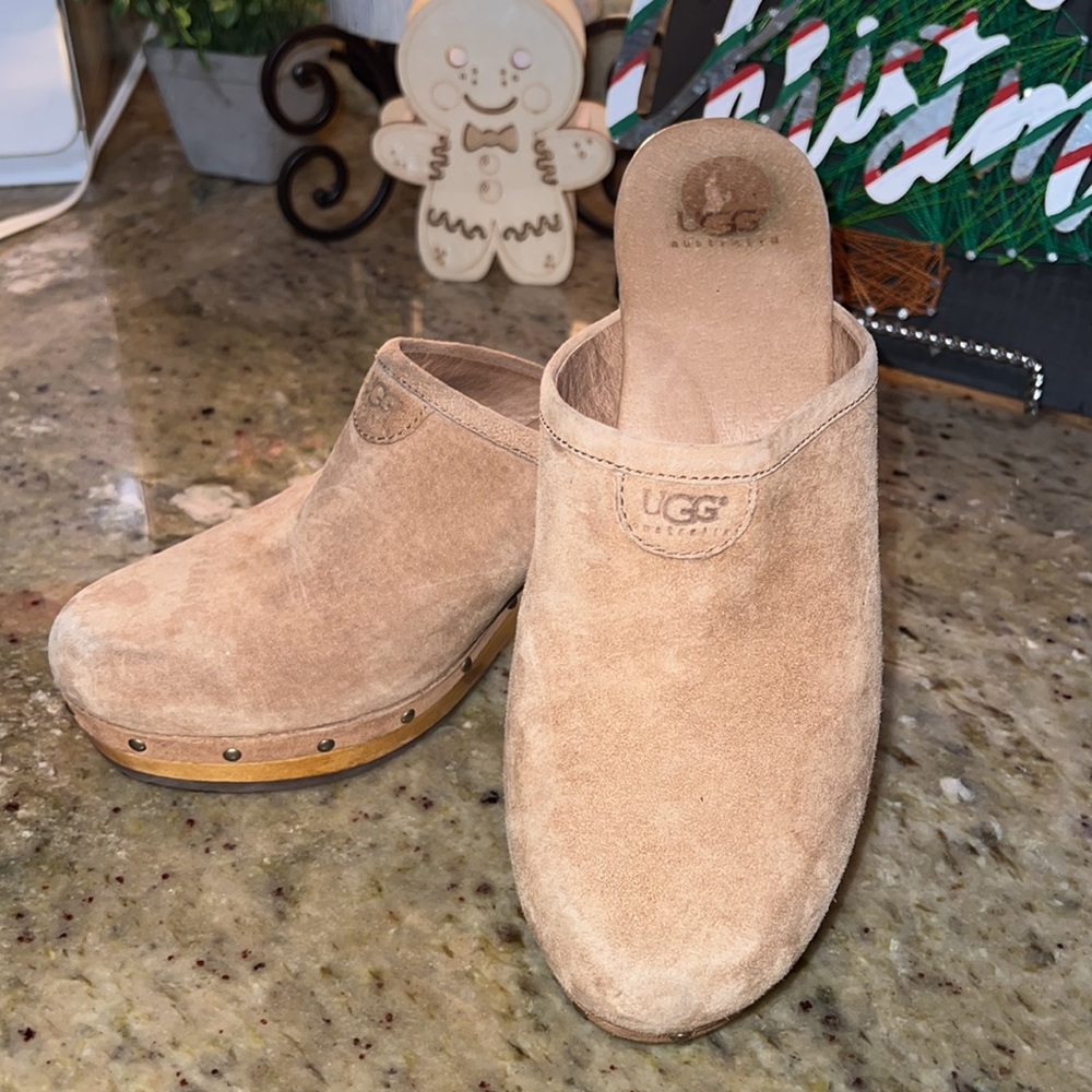 Classy UGG clogs, easily dressed up or down. Genuine leather and sheepskin…